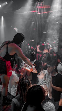 a group of people at a nightclub
